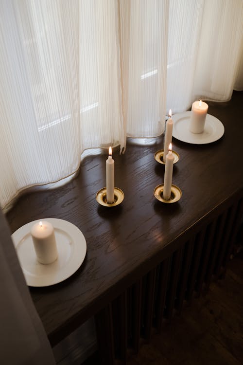 High Angle View of Candles on Window Sill