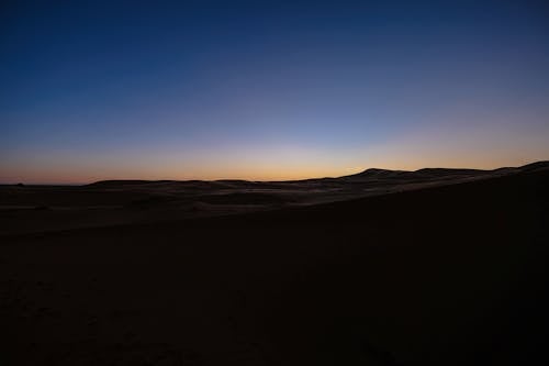 Силуэтная фотография пустыни