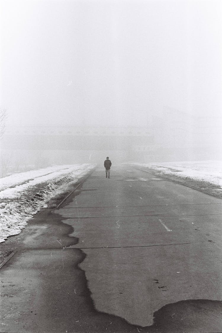 Silhouette Of Man Walking