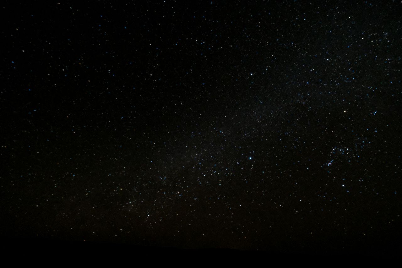 Capture of the starry night sky over Ksar Tanamouste, Morocco, showcasing a vibrant universe.