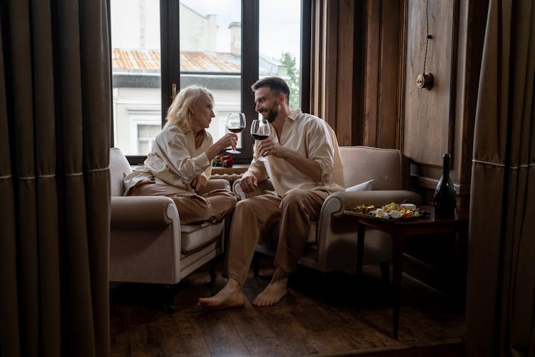 Couple Making Toast With Wine