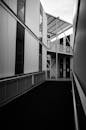 Grayscale Photo of a Building with Modern Architectural Design