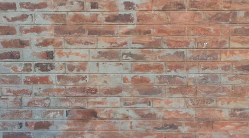 Free High-resolution image showing vintage rustic red brick wall texture, perfect for backgrounds. Stock Photo