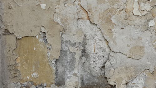 Brown Concrete Wall with Cracks