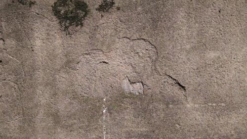 Damaged Brown Concrete Wall