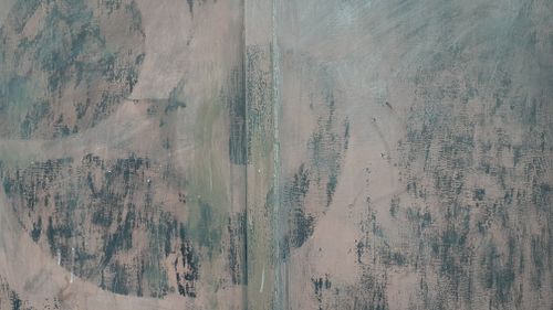 Free Close-up of an abstract textured concrete wall with a rustic design. Stock Photo