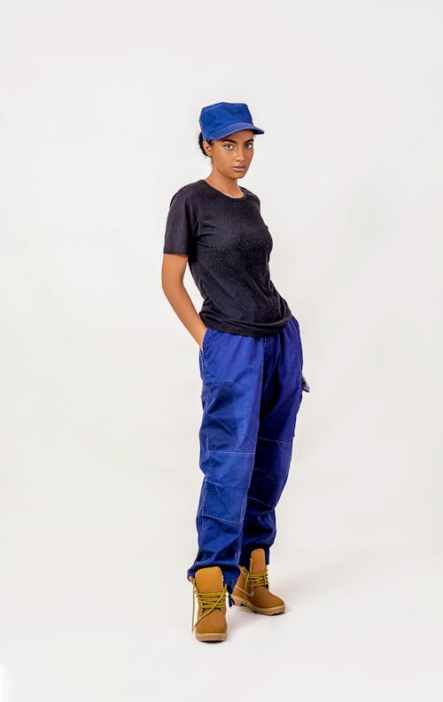 Woman in Blue Cap and Pants
