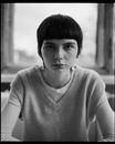 Black and White Portrait of Woman Looking at Camera with Neutral Expression