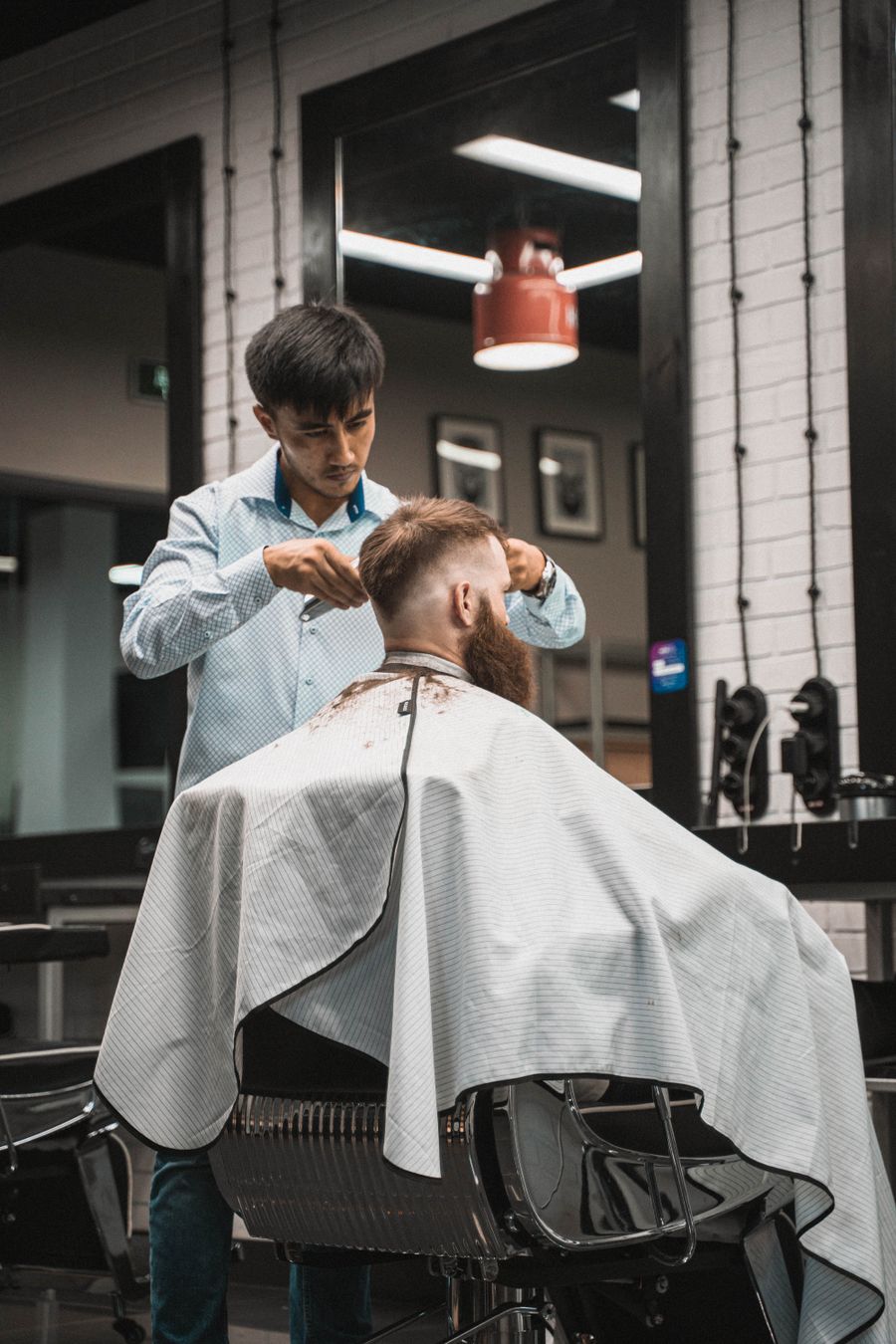 Precision haircut with professional salon scissors