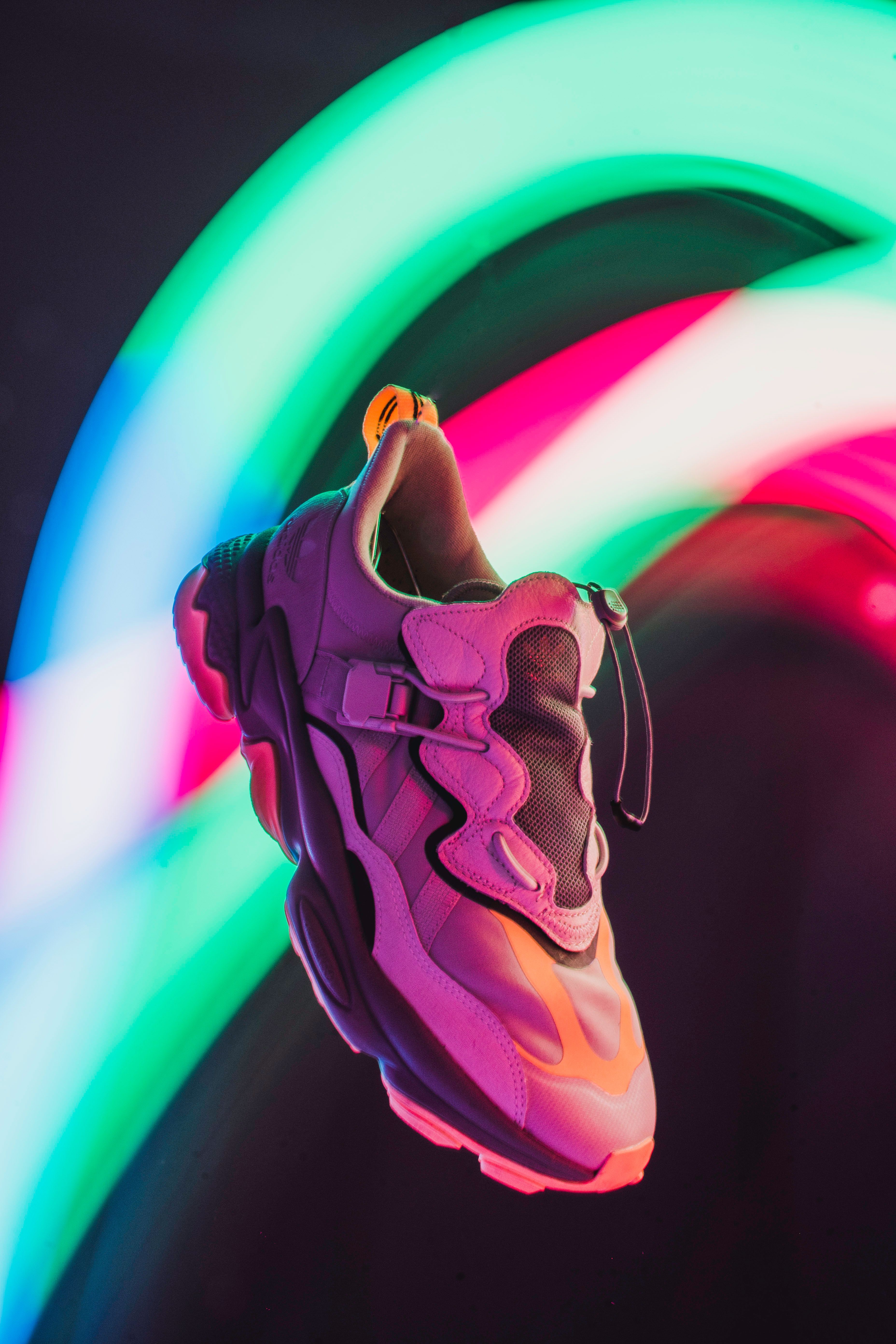 Stylish Sneaker Suspended Vibrant Neon Light Trails