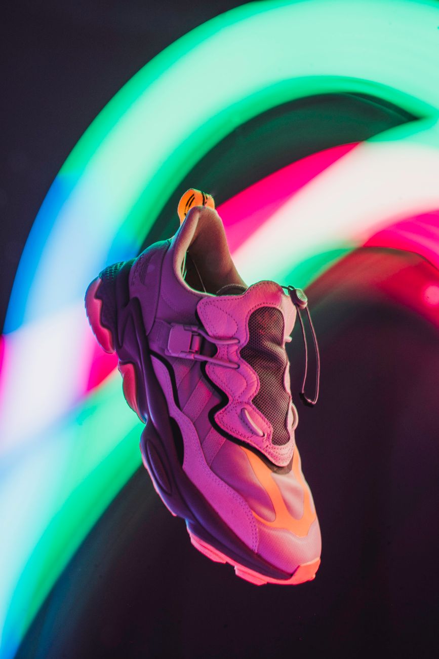 Stylish Sneaker Suspended Vibrant Neon Light Trails