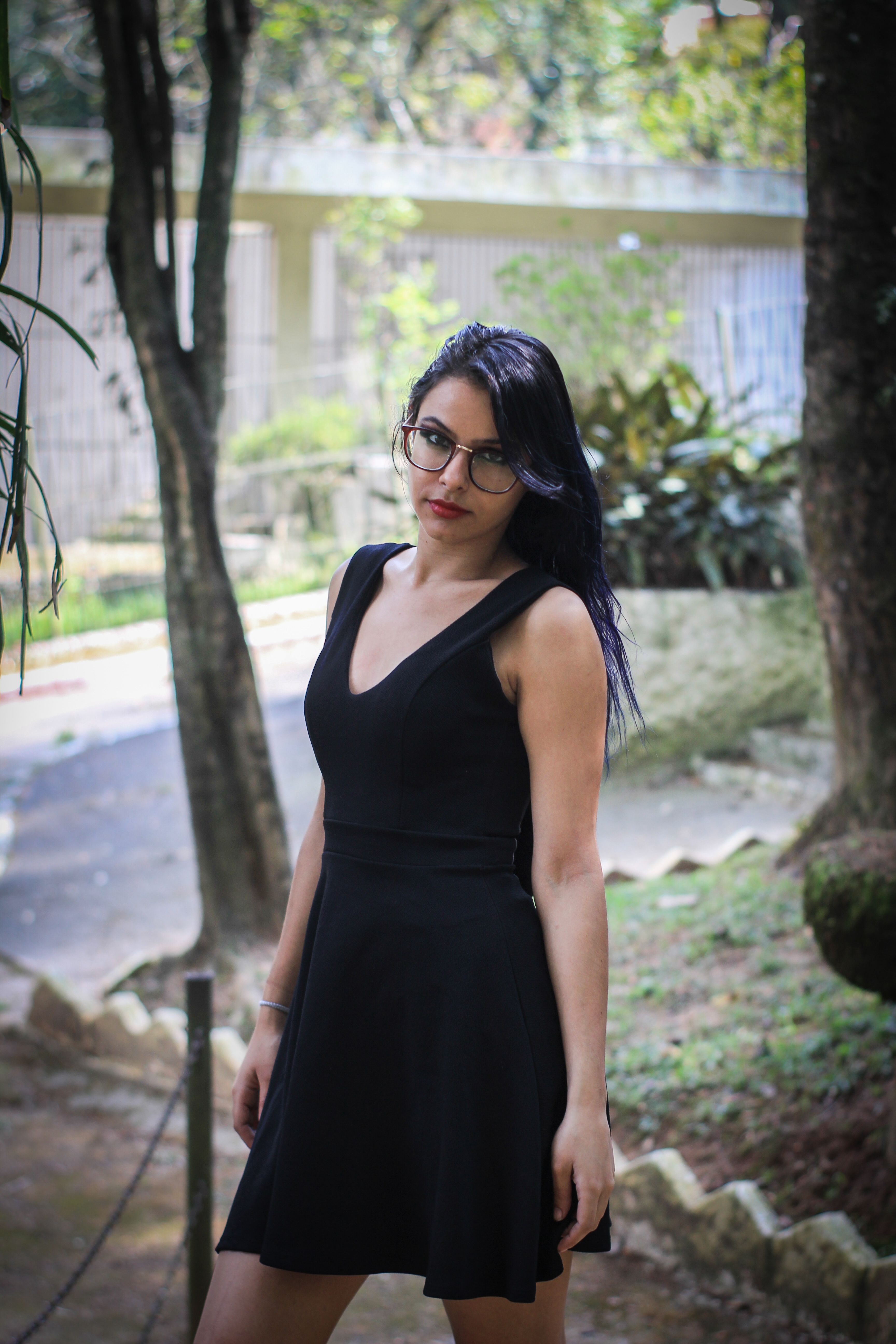 A Woman in Black Dress Posing · Free Stock Photo