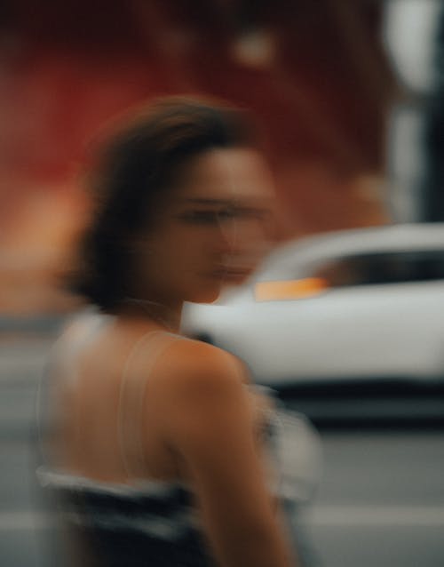 A Blurred Photo of a Woman on the Street