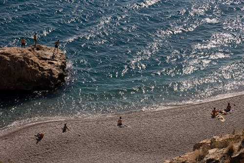 An Aerial Photography of People on the Beach