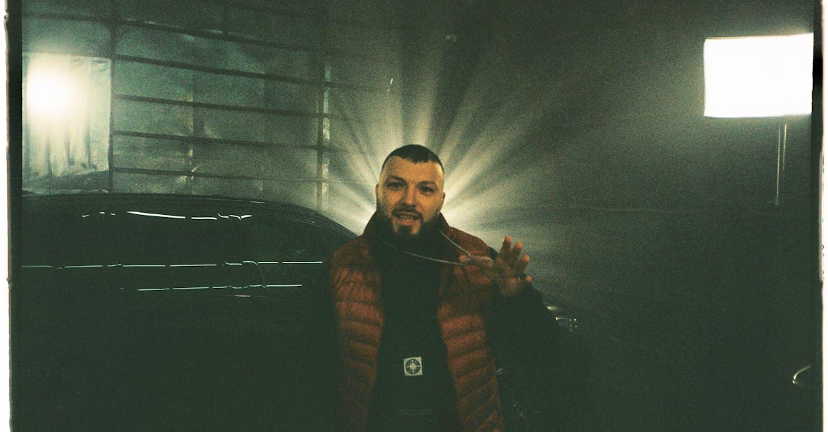 Bearded Rapper Bragging About Neck Chain · Free Stock Photo