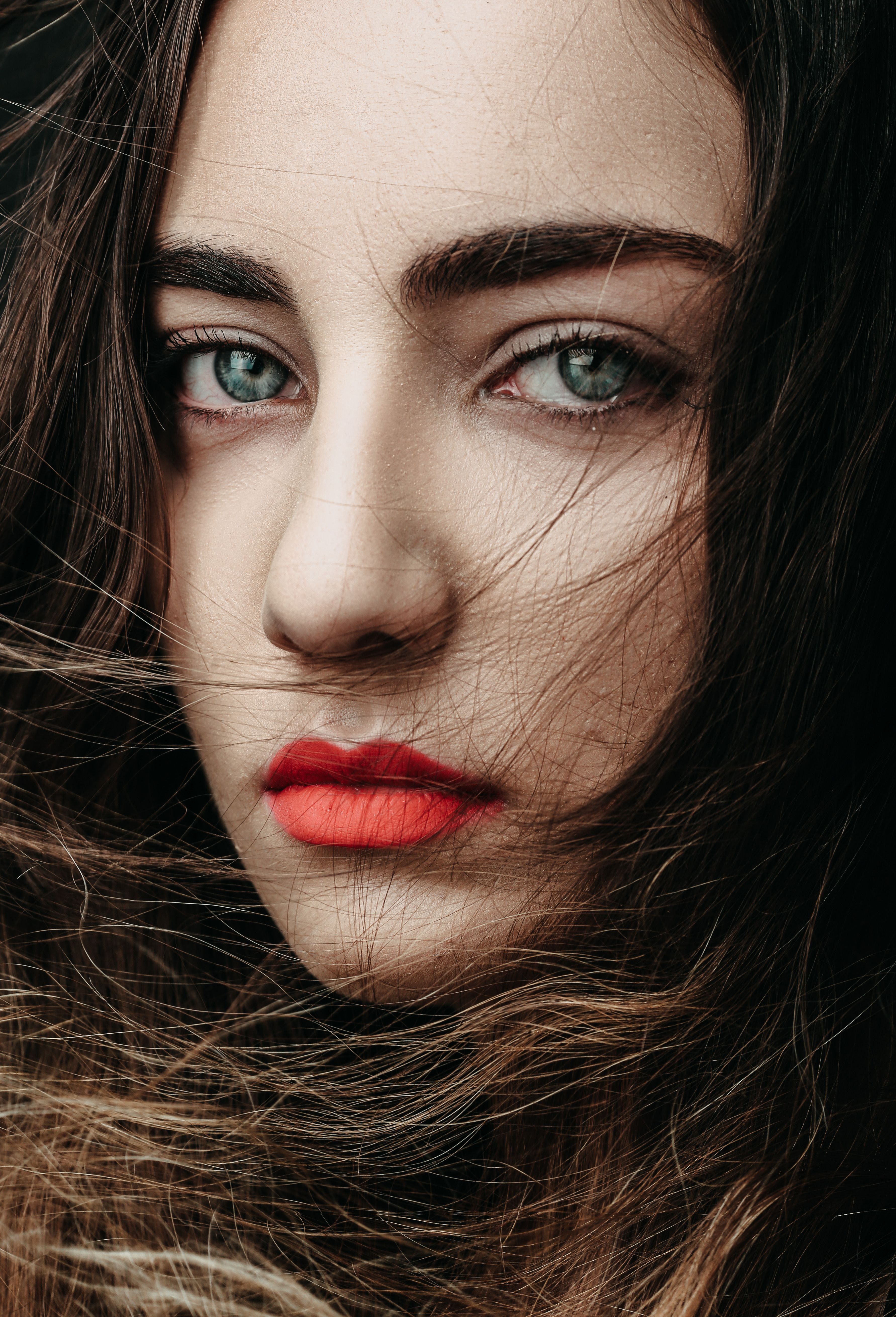 A Beautiful Woman with Green Eyes and Red Lips · Free Stock Photo