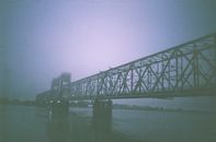 Gray Steel Bridge over Body of Water