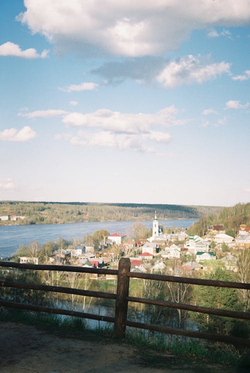 Houses and Trees Near the Lake 