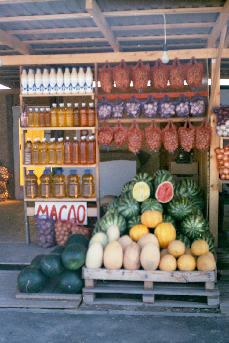 Assorted Fruits And Juices On A Store 