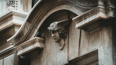 Grey Concrete Statue of a Lion