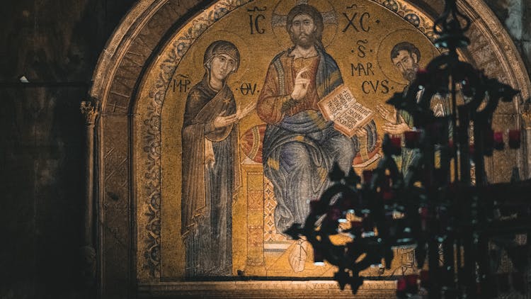 Religious Paintings Of Biblical Characters Inside A Church