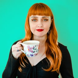 Woman Holding Clear Drinking Glass Free Stock Photo