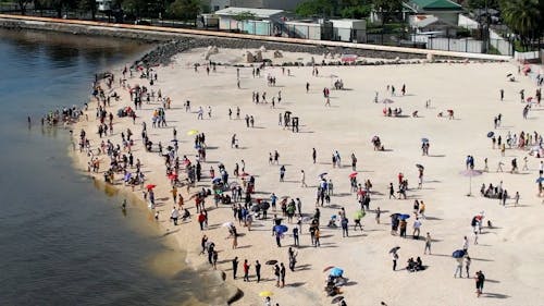 Drone Shot of Crowd on Beach