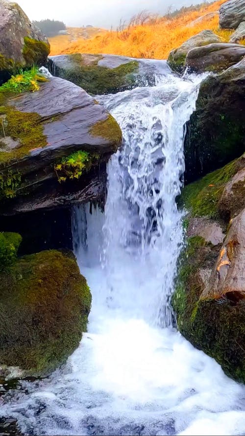 Small Waterfall in Stream and Rocks