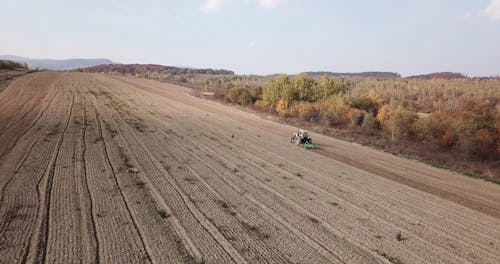 Aerial View of Tractor in Field