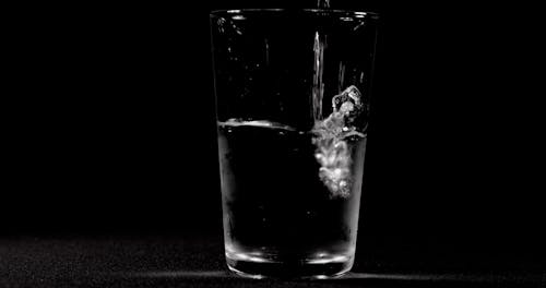 Close up of Soda being Poured into a Glass