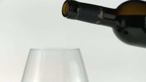 Pouring Wine In Glass