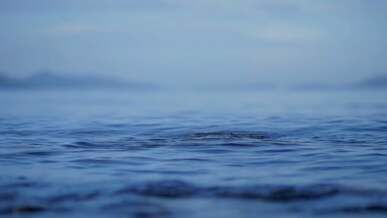 close up of blue water surface