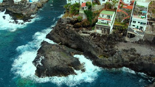 A Drone Footage of Crashing Waves on a Rock Formations