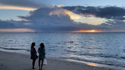 Friends Standing on the Shore