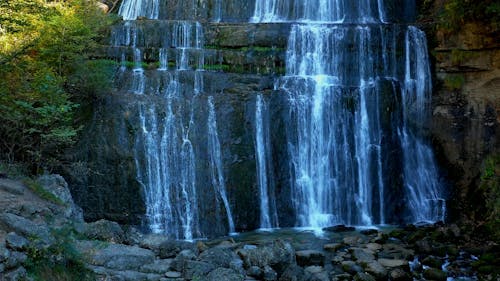 Waterfall Flowing Down Cliffs