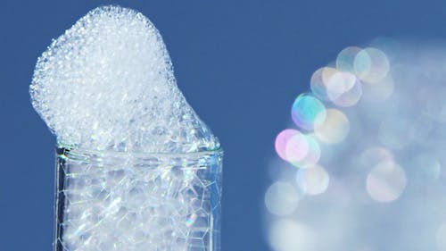 Foaming Transparent Liquid in Flasks 