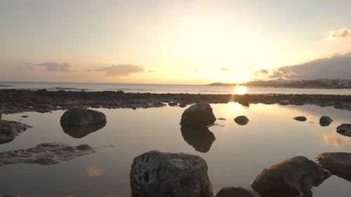 Tide Pool on Seashore at Sunset