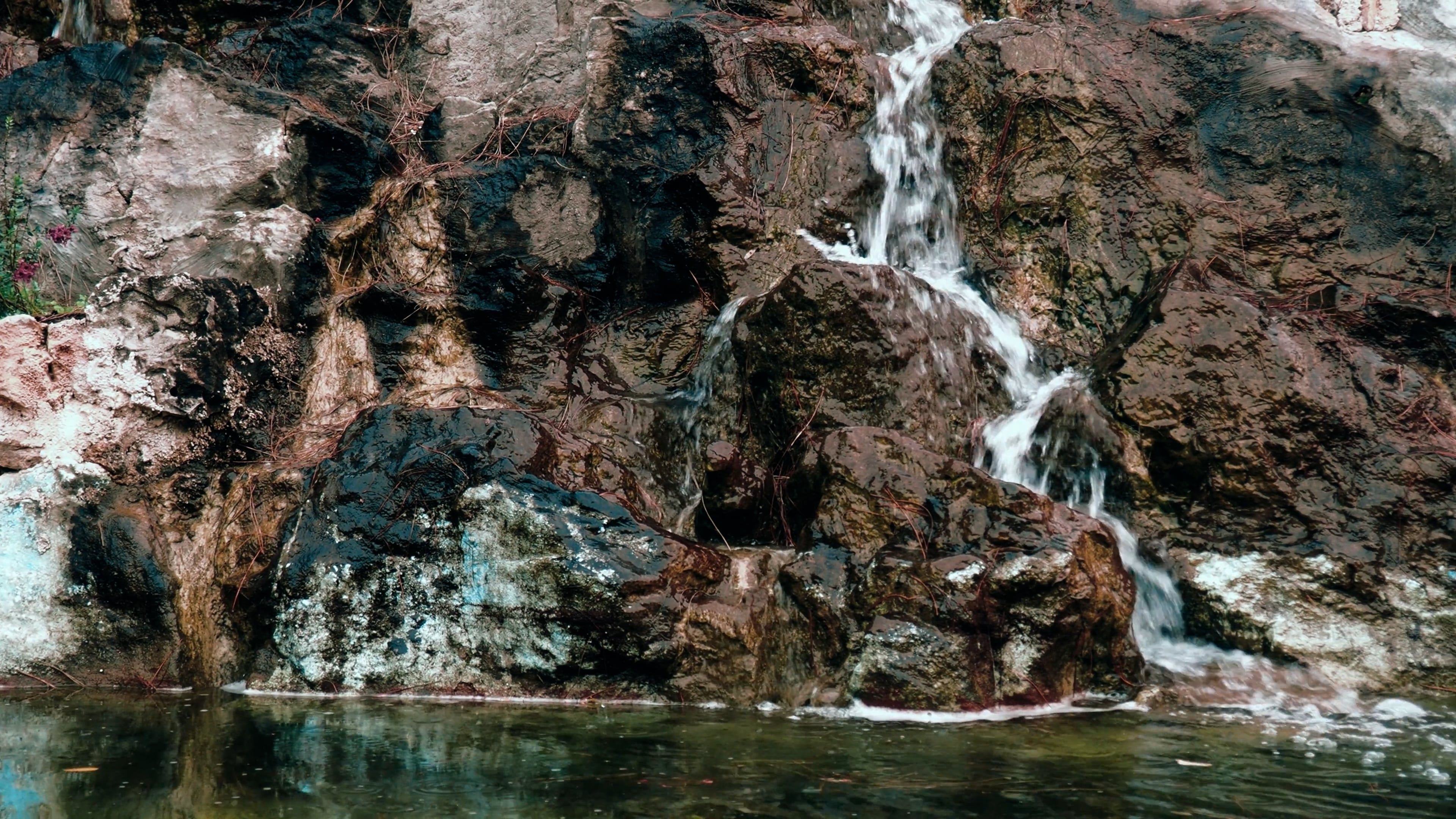 Small Waterfall Flowing Down Rocks Free Stock Video Footage, Royalty ...