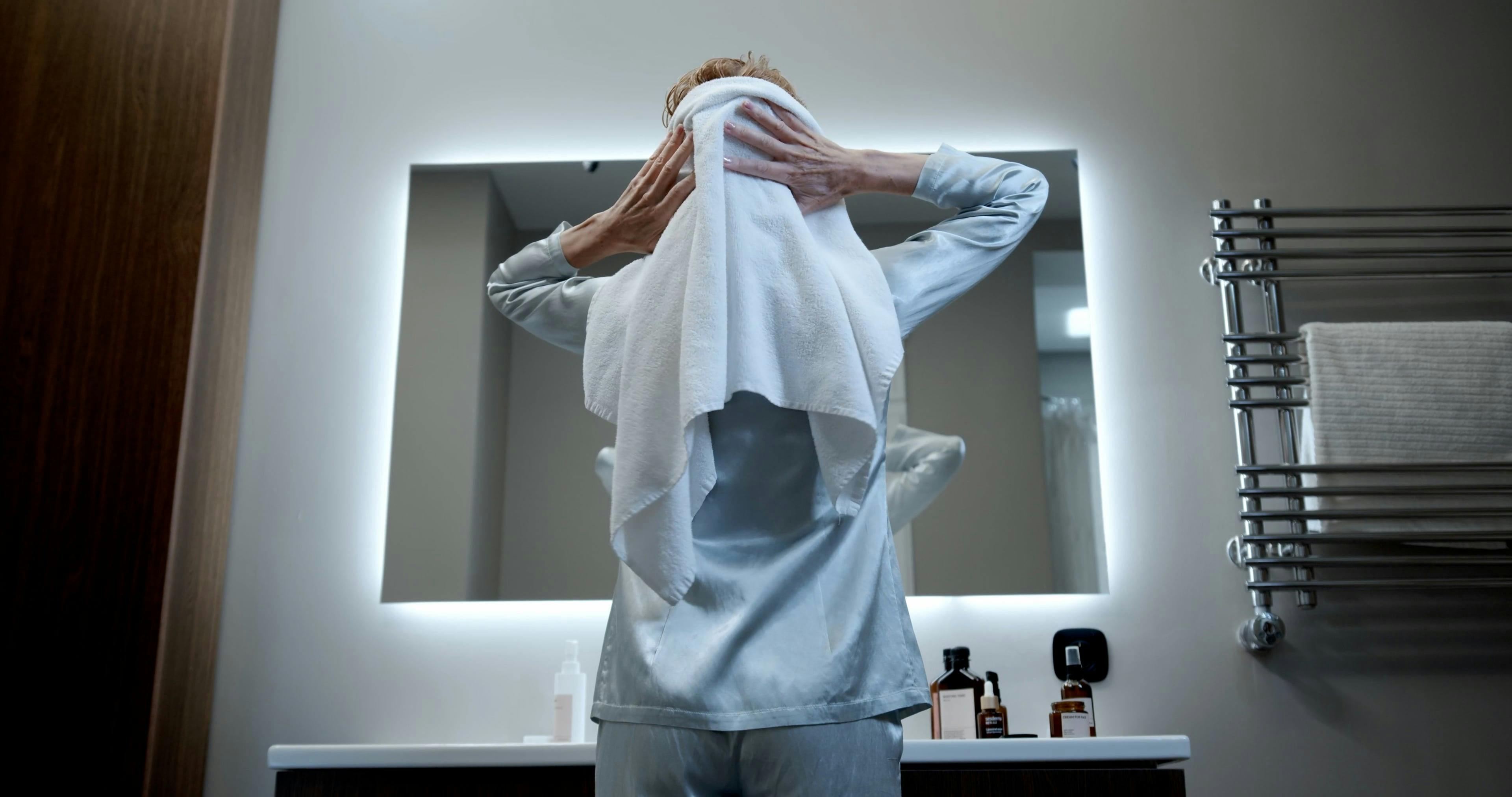 A Woman Looking at the Mirror · Free Stock Video