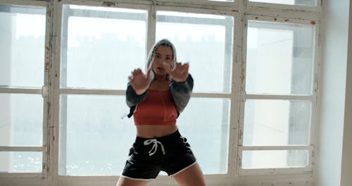 Woman Dancing in Hip Hop Style