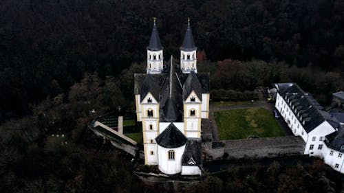 Aerial Footage of a Cloister on Top of a Hill