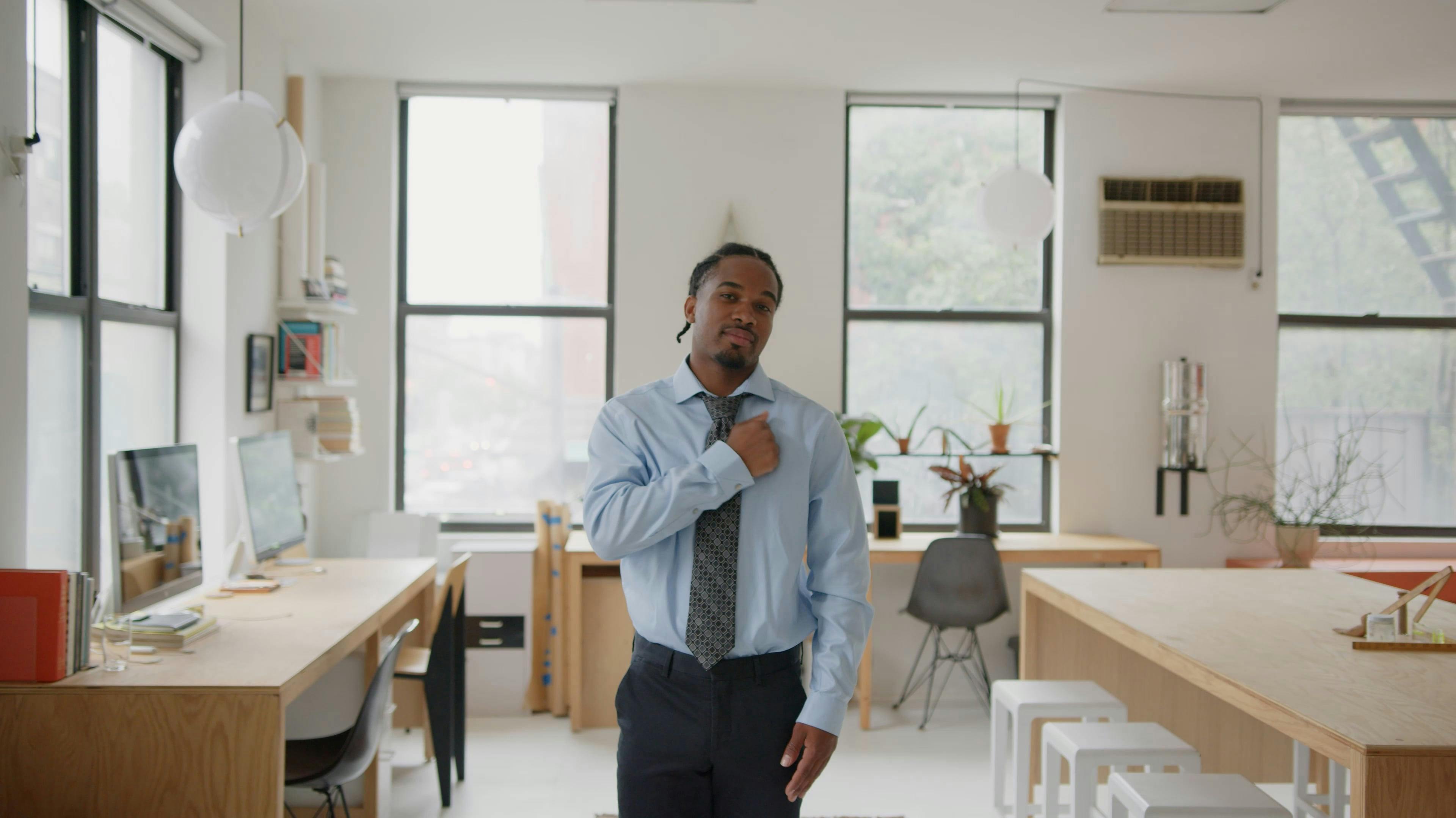 Man Inside the Office Rubbing his Chest Free Stock Video Footage