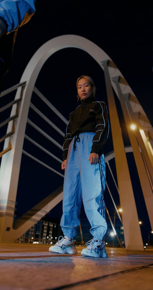 Women Standing at Night and Looking Down