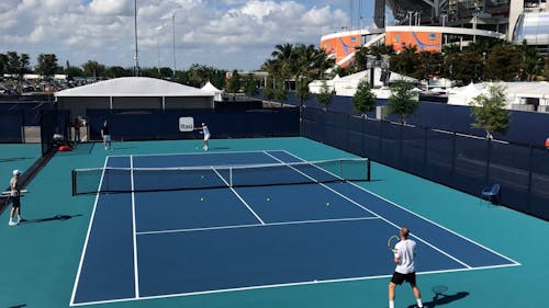 Tennis Players Playing Match