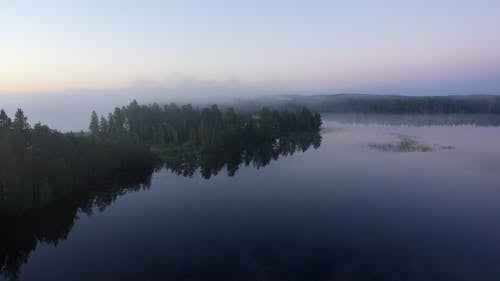 Drone Footage of a Lake on a Foggy Day