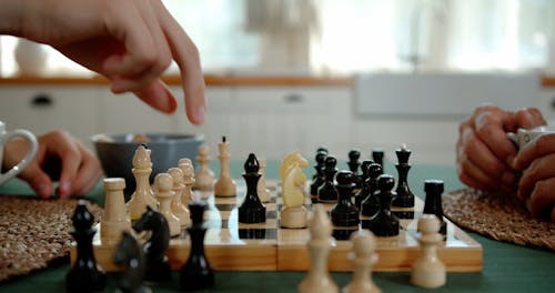 Close Up Video of People Playing Chess