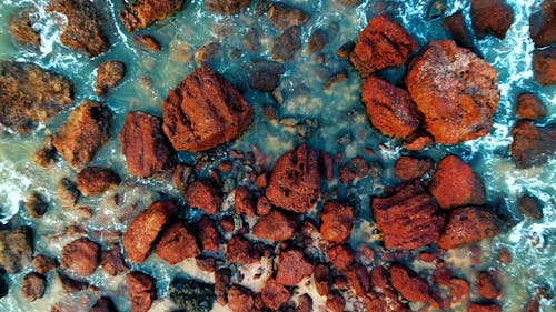 Aerial View of Rocks on Sea Coast