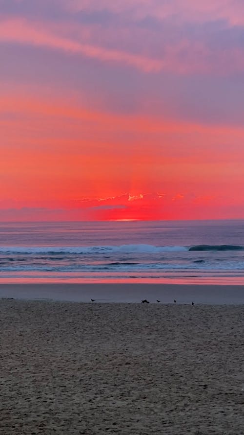 Red Sunrise over Beach