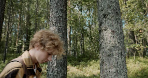 An Elderly Man and a Boy using Binoculars