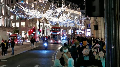 Decorated Street and Pedestrians During Christmas